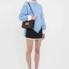 Bolso Dorian en piel marrón oscuro con relieve