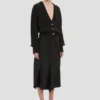 Cardigan con bolsillos trenzados en negro Cardigan con bolsillos trenzados en negro