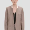 Chaqueta sin cuello en color piedra caliza