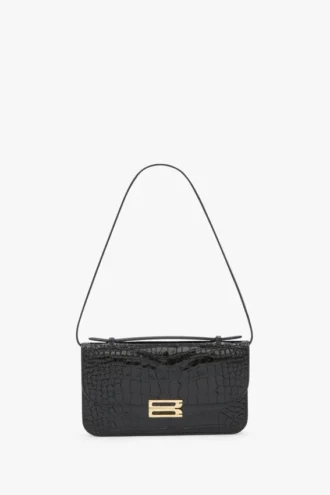 Pochette Dorian en piel negra repujada