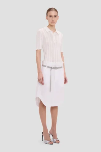 Polo con volantes en blanco