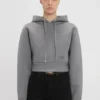 Sudadera con capucha corta y estructurada en gris jaspeado Sudadera con capucha corta y estructurada en gris jaspeado
